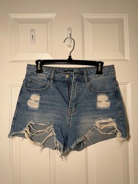 High-Rise Distressed Denim Jean Shorts in Blue